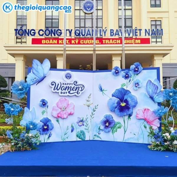 Mẫu backdrop quốc tế phụ nữ tone xanh xương