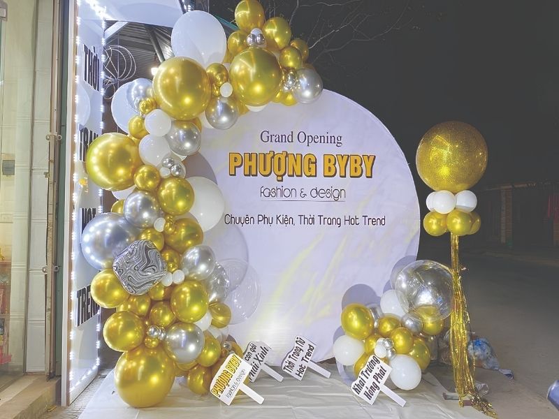 Mẫu backdrop lễ khai trương shop phụ kiện thời trang Phượng ByBy