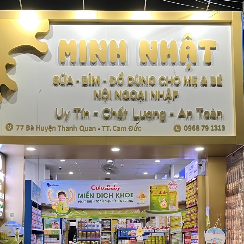 Thi c&ocirc;ng bảng hiệu cửa h&agrave;ng sữa Minh Nhật