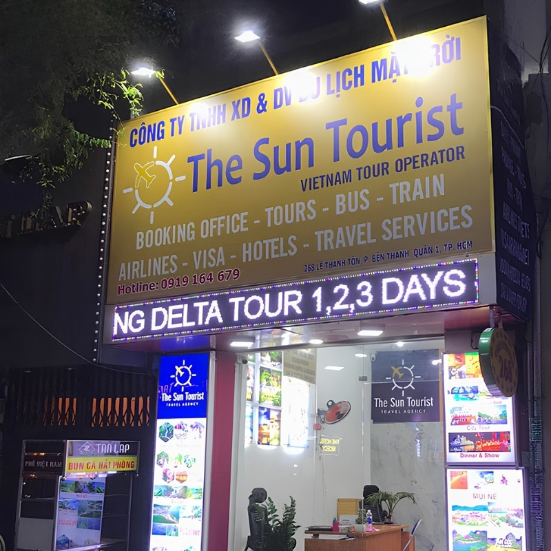 Mẫu bảng hiệu dịch vụ du lịch The Sun Tourist