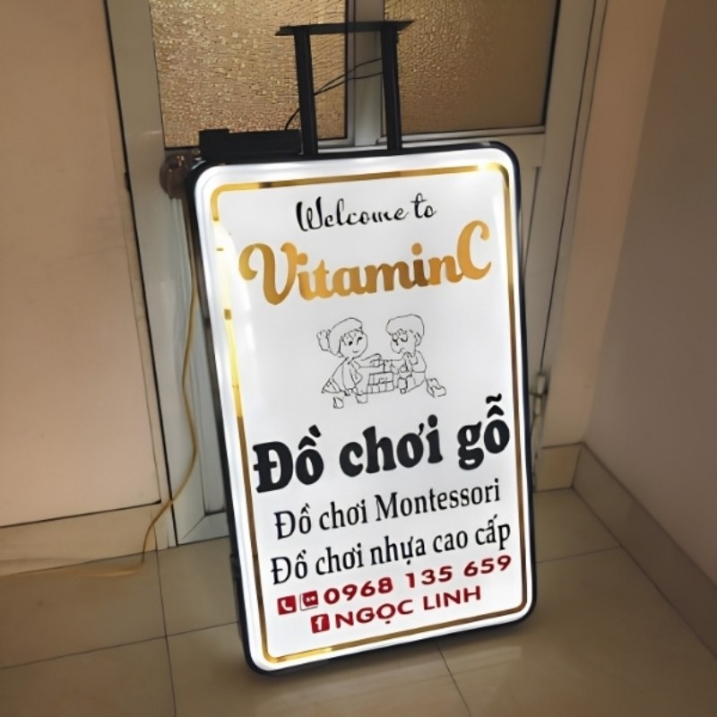 Bảng hiệu cửa h&agrave;ng đồ chơi hộp đ&egrave;n mica h&uacute;t nổi