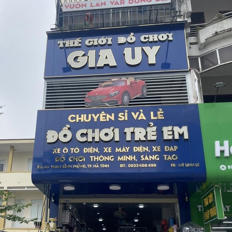 Mẫu bảng hiệu shop đồ chơi trẻ em chữ nổi inox