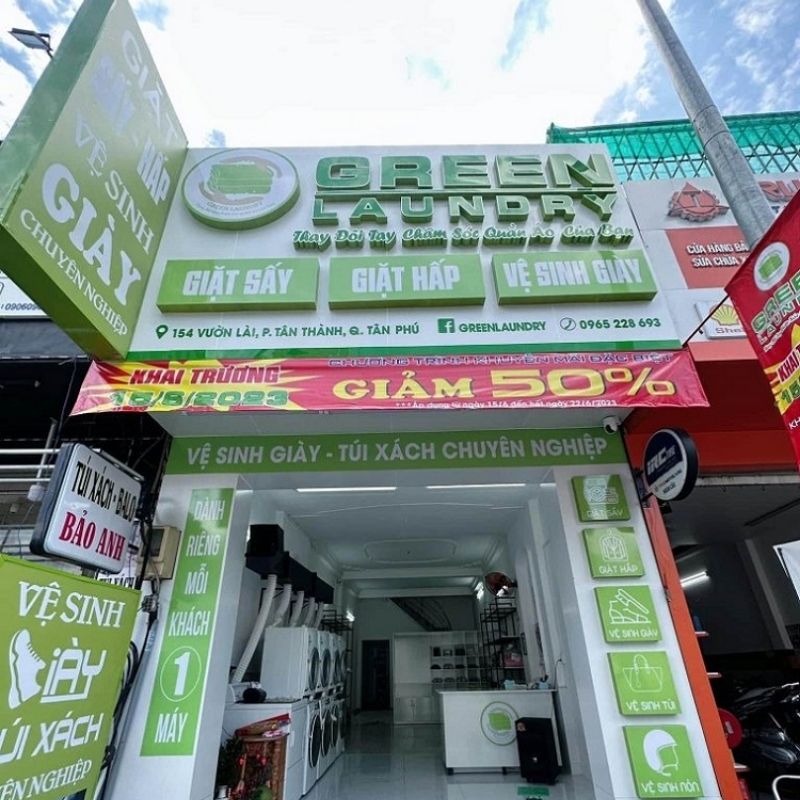 Mẫu bảng hiệu giặt ủi m&agrave;u xanh l&aacute; chuối